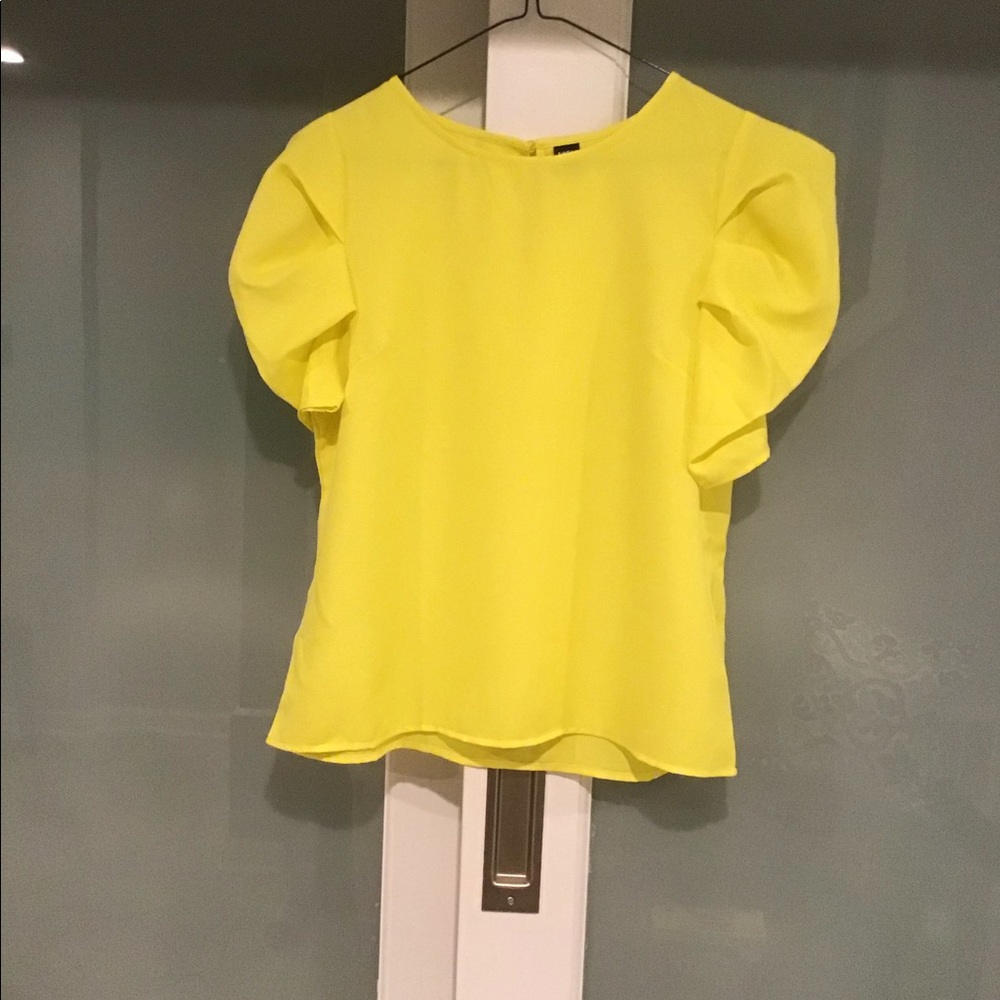 New without Tag.  Puff sleeve blouse.